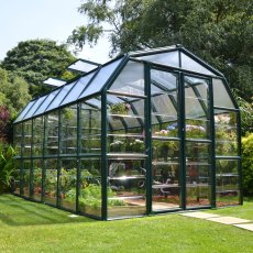 8x12 Palram Canopia Rion Clear Grand Gardener Greenhouse - in situ, angle view, doors closed