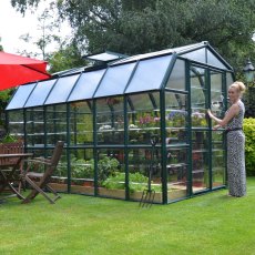 8x12 Palram Canopia Rion Clear Grand Gardener Greenhouse - in situ, side angle view
