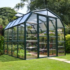 8x8 Palram Canopia Rion Clear Grand Gardener Greenhouse - in situ, angle view, doors closed