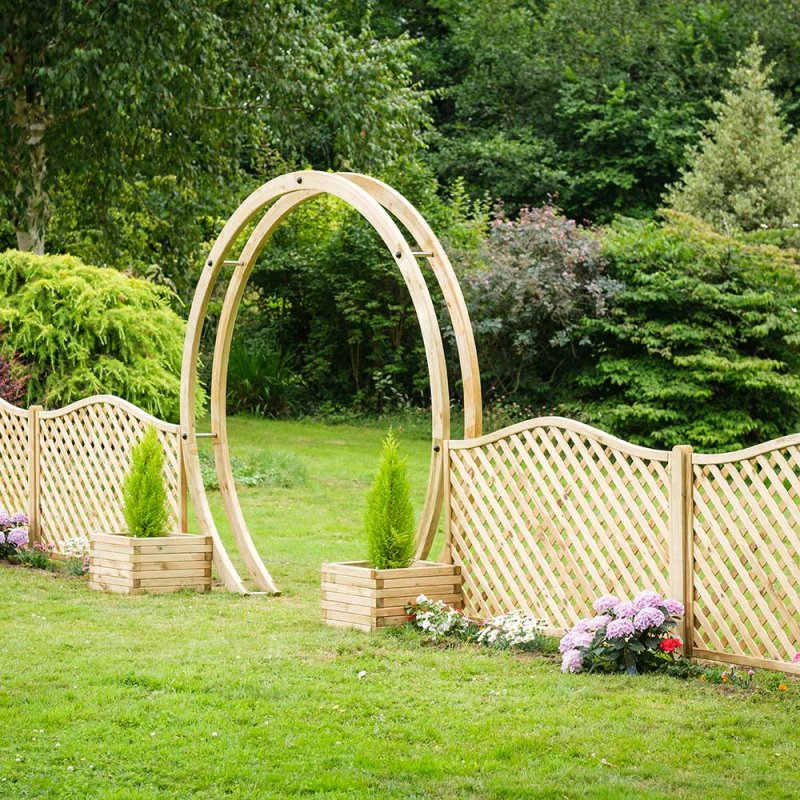 Grange Free Standing Flower Circle Wooden Garden Arch - between decorative fencing