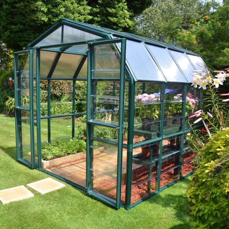 8x8 Palram Canopia Rion Clear Grand Gardener Greenhouse - in situ, angle view, doors open