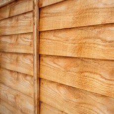 Angled close-up view of Forest Heritage lap fence panel highlighting overlapping timber boards