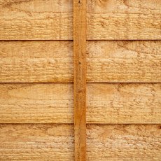Close-up detail of Forest Heritage lap fence panel showing horizontal timber boards and central batten.