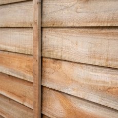 Close-up of pressure treated timber overlap boards on Forest Signature 4ft lap fence panel