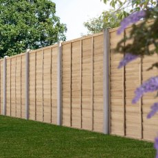 5ft high Forest Signature pressure treated lap fence panels installed along a garden boundary