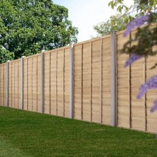 6ft high Forest Signature pressure treated lap fence panel installed in a garden setting