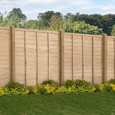 6ft high Forest Signature pressure treated lap fence panels installed along a garden boundary