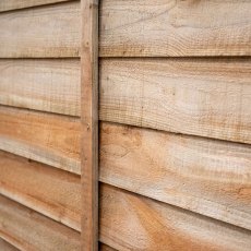 Close-up of pressure treated timber overlap boards on Forest Signature 6ft lap fence panel
