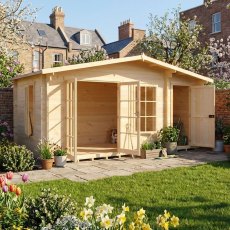 Shire Bourne 16x8 garden log cabin with open main double doors showing interior seating area in a backyard lawn setting.