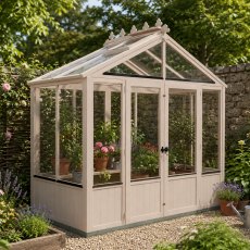 Shire Holkham 8x4 wooden greenhouse in a soft pink painted finish