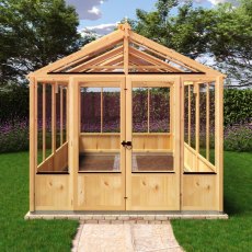 Shire Holkham 8x12 wooden greenhouse with glazing and garden plants