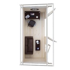Top-down interior floor plan showing desk and sofa layout inside Shire Edgefield 13x6 log cabin