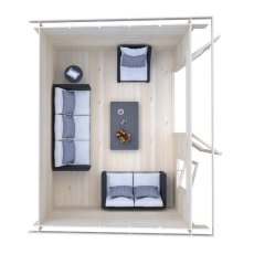 Top-down interior floor plan showing sofa and seating arrangement inside Shire Edgefield 10x13 log cabin