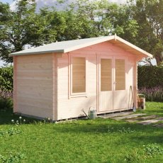 Angle view of Shire Berryfield 13x8 log cabin exterior on grass lawn