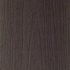 Close-up surface texture of Shire GigaShield composite decking in Tobacco dark brown wood grain.