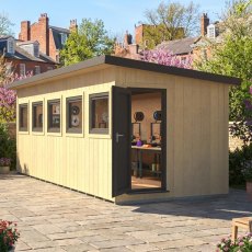 Angle view of the Shire Fortis 20x8 insulated garden office with interior light visible through open door