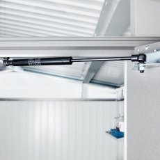 Gas damper hinge mechanism detail on Biohort Panorama metal shed door