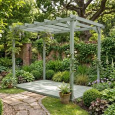 Shire 12x8 grey wooden garden pergola with decking base set beside a stone garden pathway