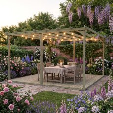 Shire 16x16 wooden pergola with decking and string lights over outdoor dining table at dusk