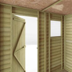 Interior view of Mercia 7x5 pent shed showing door and window light