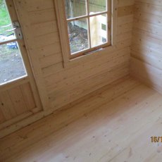 7 x 7 Shire Maulden Log Cabin - interior with detail of floor