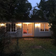 26 x 14 Shire Elveden Log Cabin - Light at night