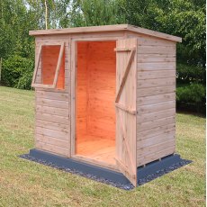 Interior view of Shire 6x4 shiplap pent shed showing wooden walls and floor