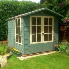 7 x 7 Shire Buckingham Summerhouse - Pressure Treated - insitu with doors closed