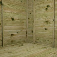 Interior corner of Mercia Vermont summerhouse showing wooden walls and floor space