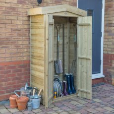 Apex tall wooden garden storage cupboard beside house with garden tools stored inside