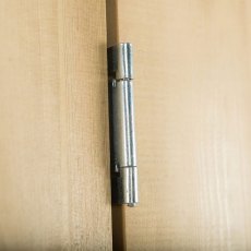 Close-up of metal door hinge on Forest Shiplap Pent Large Outdoor Store 6x3