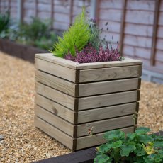 Forest Linear Planter - Square - Pressure Treated - displaying a plant