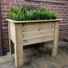 Forest Deep Root Planter - Pressure Treated - 3ft Long - with background and in use
