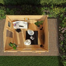 Top-down view of the interior layout of a 12x10 Mercia Apex Log Cabin showing furniture arrangement.