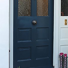 Thorndown Wood Paint - Bishop Blue - Painted on a wooden front door