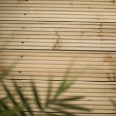 Forest Patio Deck Board - Pressure Treated 2.4m (5 Pack) - insitu showing from a horizonal view poin