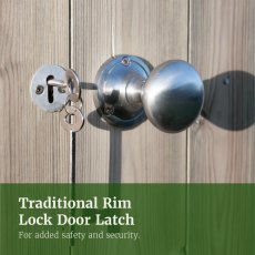 Traditional rim lock door latch and handle on wooden shed