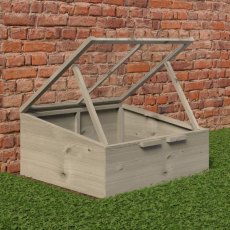 Side angled view of the Shire Holkham 4x3 wooden garden cold frame with dual propped-open hinged lids.