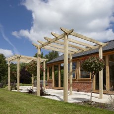 Rowlinson Wooden Pergola 2.4mx2.4m - on a patio area shows how you can use multiples pergolas to create an archway
