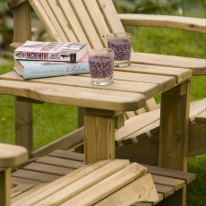 Rowlinson Softwood Adirondack Companion Seat - in situ, table