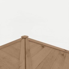 Close-up of gazebo roof apex showing central wooden cap detail