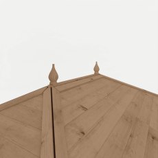 Close-up of wooden gazebo roof apex with decorative finial detail