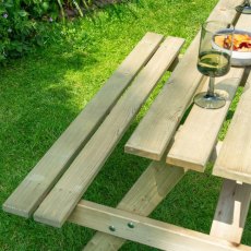 Rowlinson Traditional 4 Seater Picnic Table 1.2m - Pressure Treated - in situ, corner
