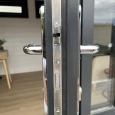 2.40m x 2.40mm Lugarde Select Oban Summerhouse - close-up view of cylinder lock with handle, supplied with two keys