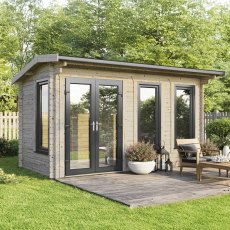 The 16 x 8 Powersheds Apex Log Cabin in 44mm log with uPVC stands in a garden with the double doors positioned on the left-hand side.