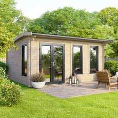 The 16 x 12 Powersheds Apex Log Cabin in 44mm log with uPVC stands in a garden with the double doors positioned on the left-hand side.