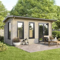 The 18 x 8 Powersheds Apex Log Cabin in 44mm log with uPVC stands in a garden with the double doors positioned on the right-hand side.