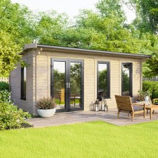 The 18 x 10 Powersheds Apex Log Cabin in 44mm log with uPVC stands in a garden with the double doors positioned on the left-hand side.