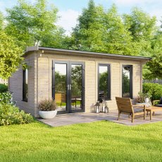 The 18 x 12 Powersheds Apex Log Cabin in 44mm log with uPVC stands in a garden with the double doors positioned on the left-hand side.