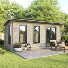 The 20 x 8 Powersheds Apex Log Cabin in 44mm log with uPVC stands in a garden with the double doors positioned on the right-hand side.